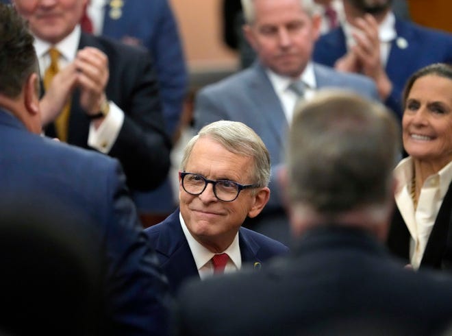Ohio Governor Mike DeWine enters the chambers of the Ohio House of Representatives before delivering his State of the State address at the Ohio Statehouse in Columbus on Wednesday.