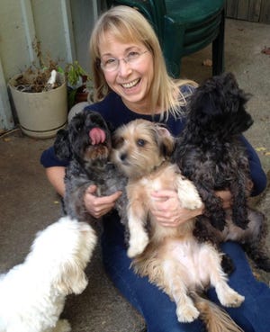 Penn High School art teacher Barb Miller was recently named Outstanding Art Educator of 2021 by the Art Education Association of Indiana (AEAI). In addition to teaching and directing the Penn art gallery, she fosters dogs.