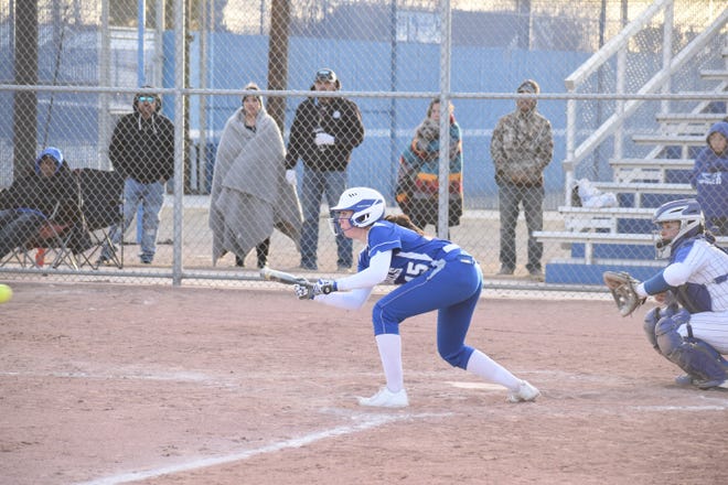 Ava Fuentes tries to lay down a bunt for the Cavegirls Tuesday night during a 10-0 win over the Lady Wildcats in Lovington.