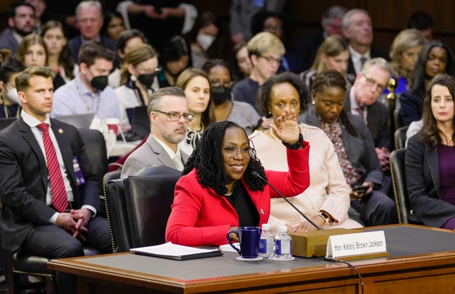 Supreme Court nominee Ketanji Brown Jackson testifies at her confirmation hearing on March 22, 2022. Behind Judge Jackson is her husband, Dr. Patrick Jackson.