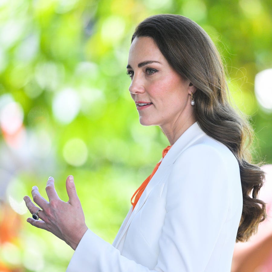 Duchess Kate of Cambridge was caught in a reflective mood during a visit to Shortwood Teacher's College in Kingston, Jamaica, on March 23, 2022.