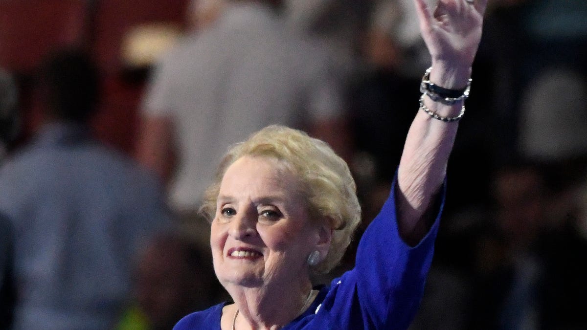 Former U.S. Secretary of State Madeleine Albright reacts to the convention goers as she makes her way on the stage during the 2016 Democratic National Convention at Wells Fargo Arena on July 26, 2016.