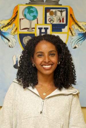 Highland School of Technology senior Wehazit Mussie received a scholarship to UNC.