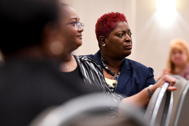 Mayor Jacqulyn Boone of Fort Deposit listens during a session at Hotel Capstone in Tuscaloosa on Wednesday. The Alabama Healthy Homes project aims to renovate residences in rural Alabama to ensure they aren't contributing to health problems.