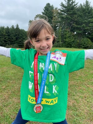 Acton resident Addie Tajima, 9,  has walked in the Boston Marathon Jimmy Fund Walk six times.