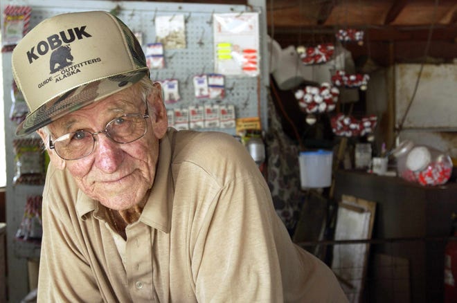 Benny Rotgers spent a lifetime fishing and hunting on the St. Johns River. Here he is seen in March 2003 at age 81 behind the counter at his shop, Rotgers' Bait Shop, which was located at 3530 New Haven Avenue in West Melbourne.