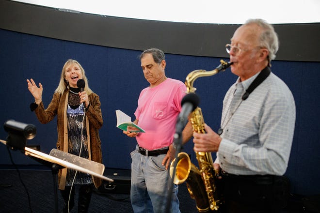 Poet, Dr. Donna Decker, singer-songwriter Frank Lindamood and composer Dr. James A. “Andy” Moorer rehearse for their live reading of poems from Decker's book, including "Man in the Mangroves," which they have transformed into a short film.