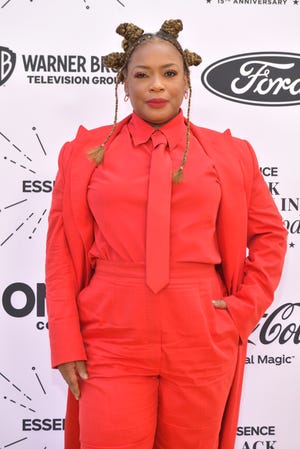 "king richard" and "lovecraft country" star ajnanew ellis stunned in a vibrant red suit at the essence black women in hollywood awards on march 24.