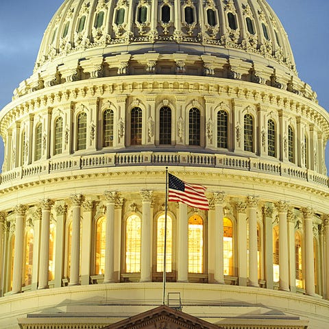 The dome of the U.S. Capitol is seen at dusk on De