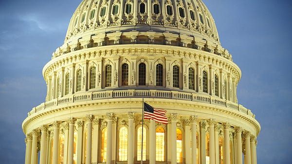 The dome of the U.S. Capitol is seen at dusk on De
