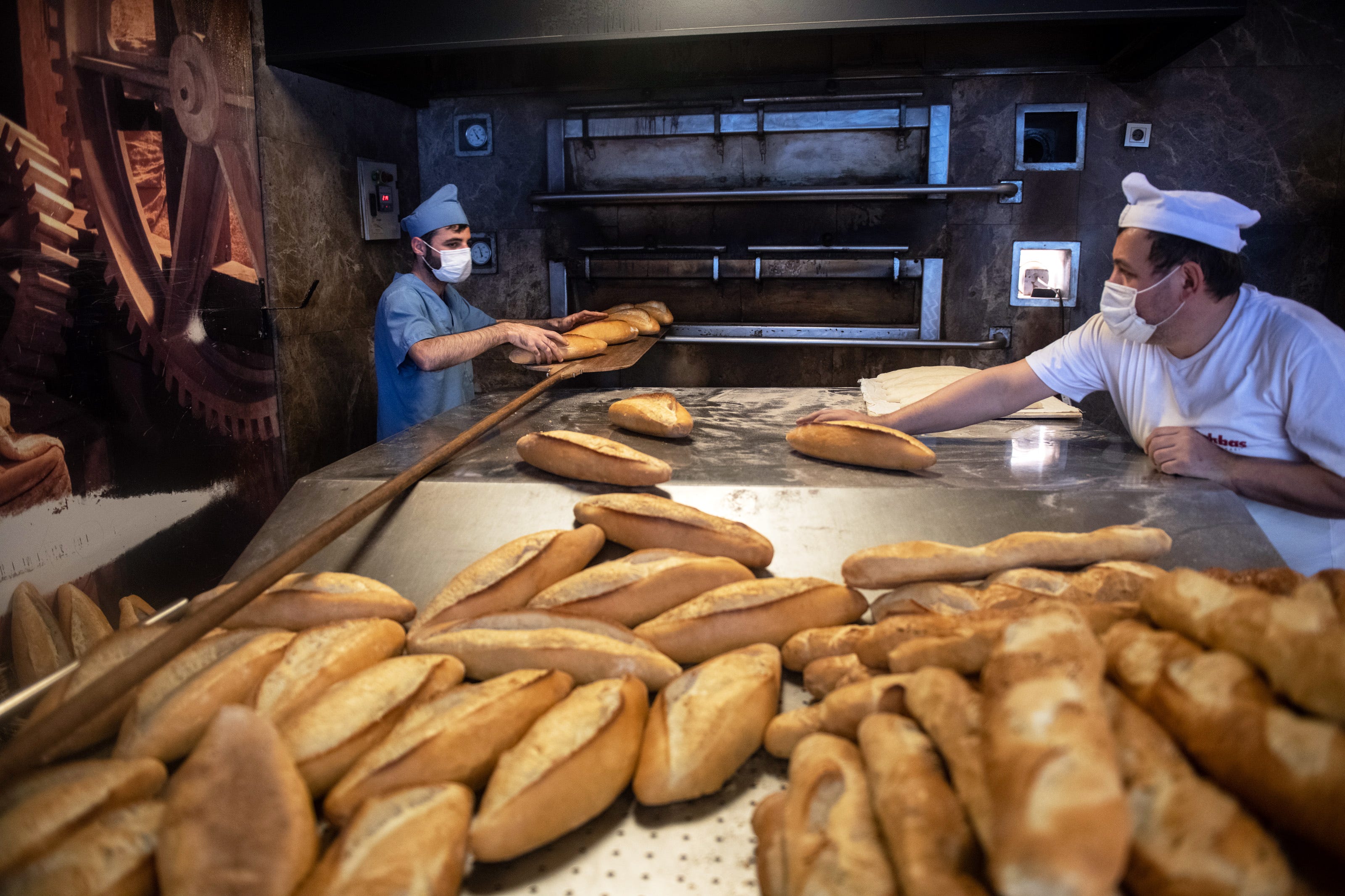 Employees bake bread at a bakery in Istanbul on March 23. Turkey's wheat imports from Ukraine and Russia reached record levels in 2021.