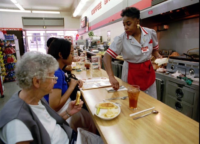 Waitress Lou Jackson works the coffee-shop lunch counter at the F.W. Woolworth store at 109 S. High St. in 1997 after the parent company had announced it would be closing its 400 remaining U.S. stores.