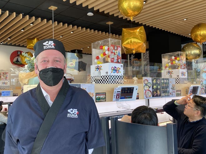 Andrew Wilbur, manager of Kura Revolving Sushi Bar in Watertown.