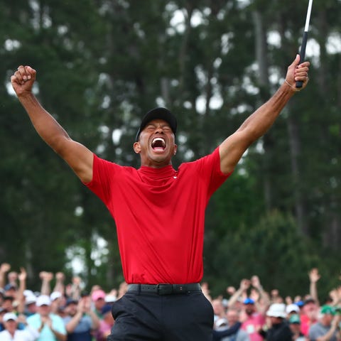 Tiger Woods celebrates after winning the 2019 Mast