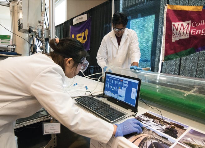 New Mexico State Engineering students evaluate their green computer in the WERC Environmental Design Contest.