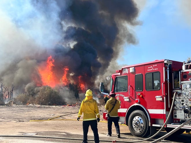 Cal Fire was battling a wildfire in Oasis, off of Highway 86 and Avenue 72, on Saturday, March 26, 2022. The fire forced the closure of southbound Highway 86.