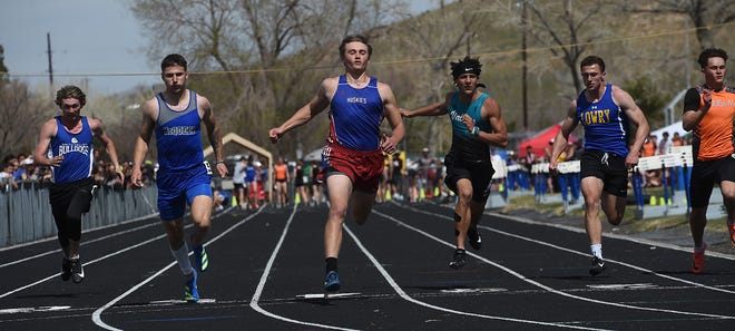 Reno's Niko Amari, middle, won the boys 100-meter dash during the Reed Rotary track and field event in Sparks on Saturday.
