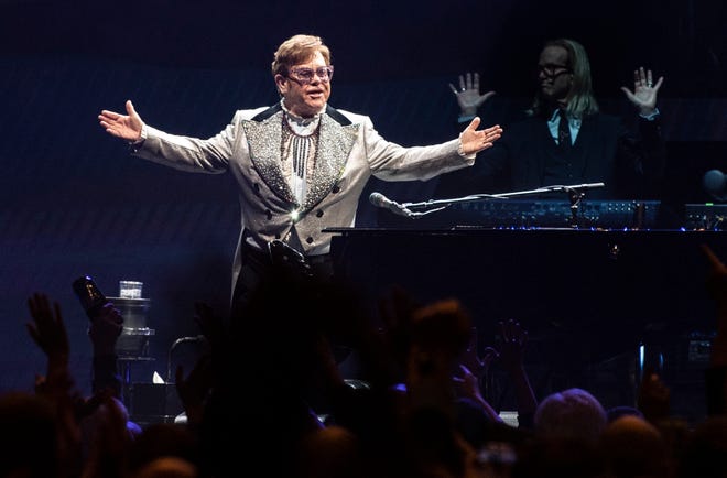 Elton John performs on stage during his "Farewell yellow brick road" tour at Wells Fargo Arena on Saturday, March 26, 2022 in Des Moines.