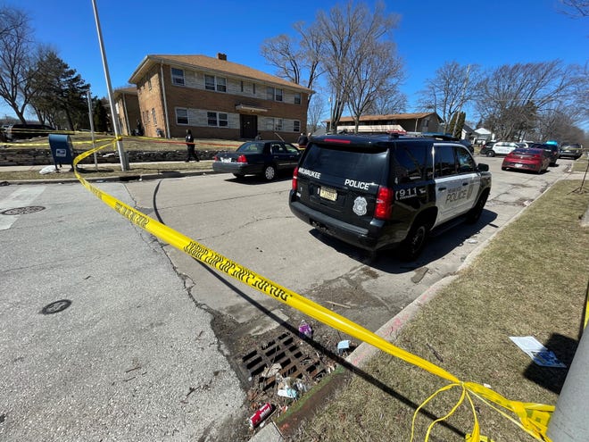 Milwaukee police are at the scene of a triple homicide in the 6400 block of North 54th Street on March 27. The three killings were among 53 reported in the first three months of 2022, more than double what was reported during the same period in 2021.