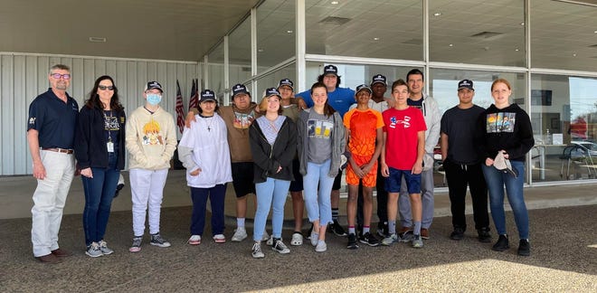 A group of Henderson Junior High students visited Bruner Motors on Friday. They learned about the proper maintenance of cars as well as explored a variety of careers available at Bruners.