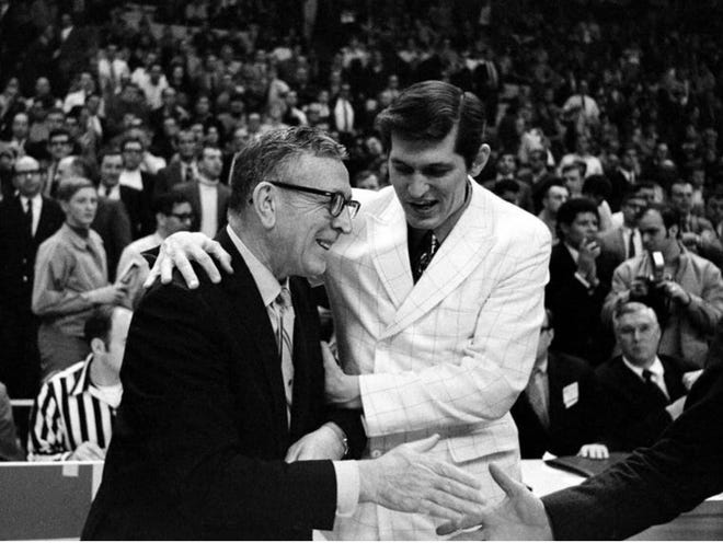 Future Furman coach Joe Williams, right, with UCLA coach John Wooden in 1970.