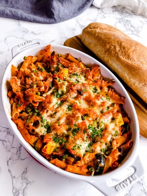 Three Cheese Penne Casserole features red bell peppers, zucchini, yellow squash, vidalia onions, cremini mushrooms, and frozen green peas.