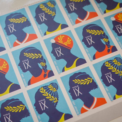 A page of Title IX commemorative stamps belonging 