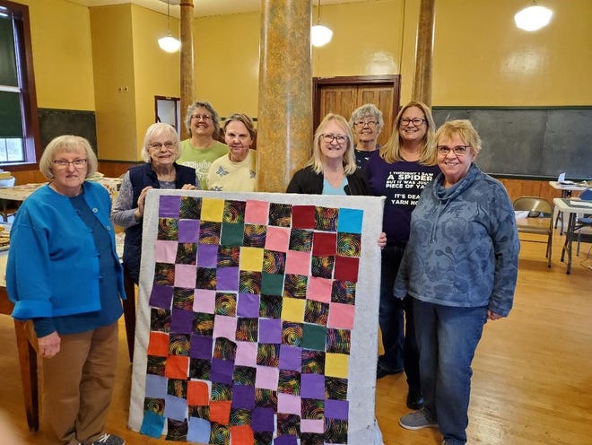 Members of the Prairie Queen Quilt Club met for their charity Day of sewing on March 22. The Quilt club makes quilts for local organizations. The ladies are happy to show one of their designs of the children's quilt for the Braveheart Children Advocacy Center. The members have over 30 quilts in progress for this year‘s project. Members from left to right Sally Reinhart, Marilyn Nelson, Karen Sayre, Sharon Tilden, Tawnee Lovinski and Janene Blodgett. Back row from left Deanna Jodts and Kathy White.