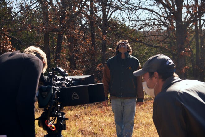 From left, director of photography Matt Bauske, actor Alex Sanchez and co-writer and director Nick Sanford work on location on the Bigfoot comedy 