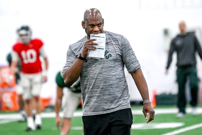 Michigan State football coach Mel Tucker looks on during practice on Tuesday, March 29, 2022, at the indoor football facility in East Lansing.