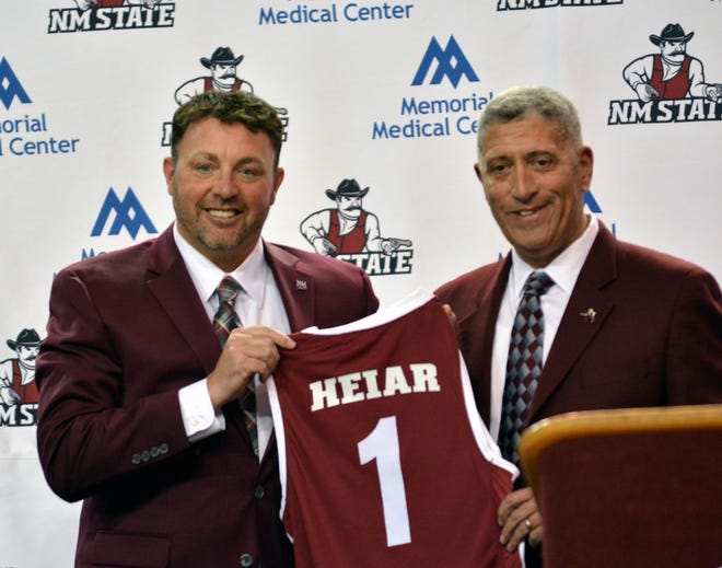 New NMSU head basketball coach Greg Heiar poses with athletic director Mario Moccia after being introduced as head coach on March 28, 2022.