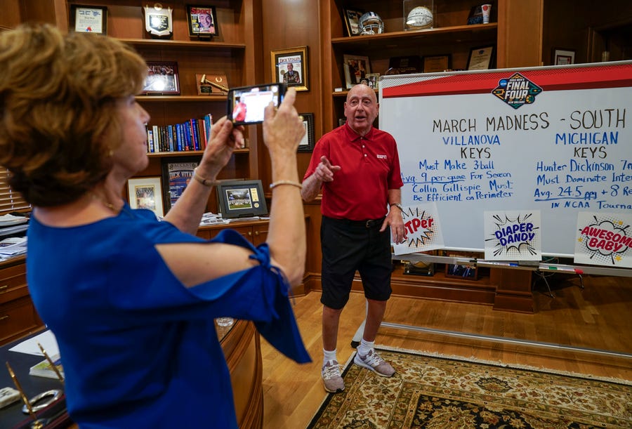 Mar 23, 2022; Lakewood Ranch, Fla. 34202, USA; March 23, 2022; Florida, USA. Dick Vitale, an analyst and champion of college basketball for more than four decades on ESPN, begins to get his voice back and records video clips with the help of his wife Lorraine McGrath analyzing NCAA tournament upcoming matchups for ESPN and his extensive social media followers as he recovers from cancer treatment and recent vocal cord surgery at home in Lakewood Ranch, Florida on Thursday, March 24, 2022.     In 2021, Vital was diagnosed with melanoma but was cancer-free. Just months later in 2021, he was diagnosed with lymphoma, and also required surgery for a bile-duct blockage that same month. Vitale made a return to calling the game between top ranked Gonzaga and number 2 ranked UCLA in November after missing the start of the NCAA basketball season due to chemotherapy. However, later in the December Vitale's doctors discovered he had precancerous dysplasia and ulcerated lesions on his vocal cords requiring vocal cord surgery and he would not be able to return to calling NCAA basketball games for the rest of the season and would be under strict doctors orders to not talk for nearly three   months while Vitale recuperates from the vocal cord surgery. Mandatory Credit: Jack Gruber-USA TODAY