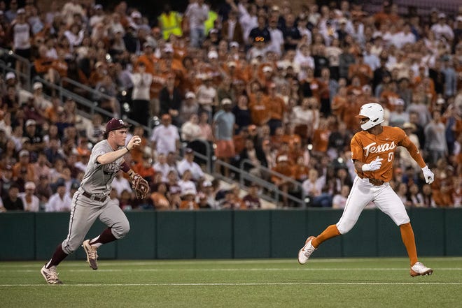 Texas' Trey Faltine is chased down by Texas A&M third baseman Ryan Targac during the Aggies' 12-9 win at UFCU Disch-Falk Field on March 29. The Longhorns and Aggies will meet again Sunday in a College World Series elimination game in Omaha, Neb.