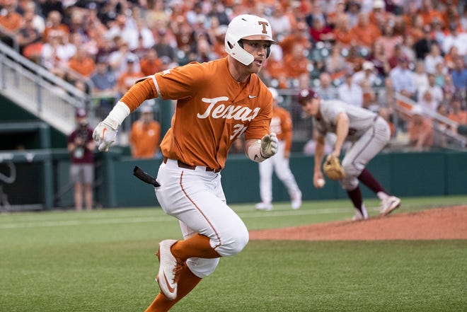 Texas's Eric Kennedy runs first during the game against Texas A&M at Disch-Falk Field on Tuesday, March 29, 2022. 