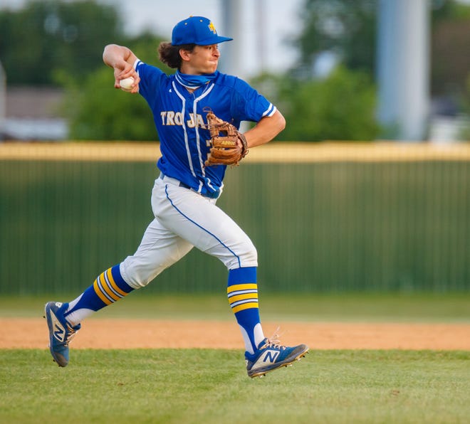 Anderson infielder Evan David, firing the ball to first base against College Station, earned player of the week honors after swatting six doubles and a triple as the Trojans won three games and the team of the week award.