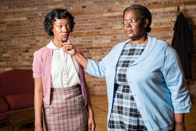Camara Stampley, left, and Wydetta Carter portray members of the Younger family in the musical "Raisin," staged by Skylight Music Theatre.