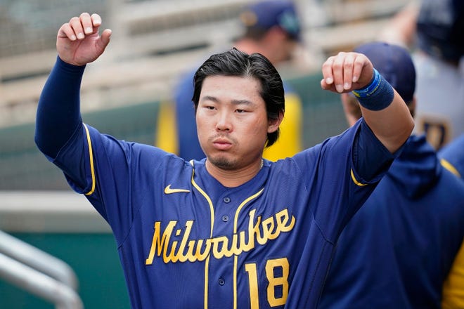 Milwaukee Brewers' Keston Hiura stretches out prior to a spring training baseball game against the Cleveland Guardians Tuesday, March 29, 2022, in Goodyear, Ariz. (AP Photo/Ross D. Franklin) ORG XMIT: AZRF101