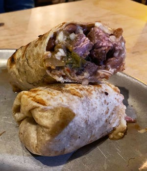 The carne asada burrito at Bacanora is packed with thick cubes of rare skirt steak.