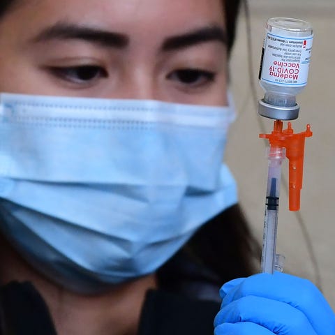 The Moderna Covid-19 vaccine is prepared for admin