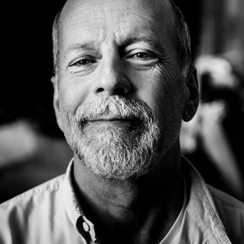 Bruce Willis poses shortly before his broadway deb