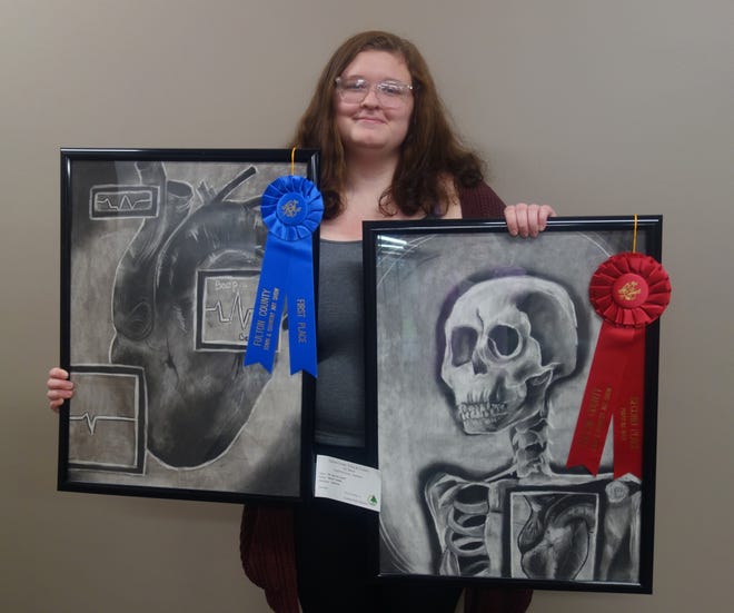 Spoon River College art student Melody Barnes took home first place in the Amateur Division with her charcoal drawing “My Beating Heart,” and second place in the Popular Vote with another charcoal drawing entitled “Have a Heart” at the Fulton County Town and Country Art Show held March 11 at the Donaldson Community Center.