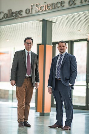Former Plymouth State Representative Vinny deMacedo, left, and Steve Zuromski, vice president of information technology and chief information officer at Bridgewater State University, have teamed up to bring a security operations center and cybersecurity field to the school.
