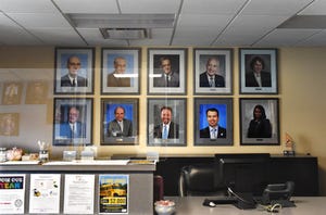Portraits of the previous Washoe County School District superintendents are on display in the front lobby of the administration building at
425 E. 9th St.