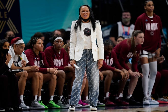 South Carolina head coach Dawn Staley reacts during the first half of a college basketball game in the semifinal round of the Women's Final Four NCAA tournament Friday, April 1, 2022, in Minneapolis. (AP Photo/Charlie Neibergall)