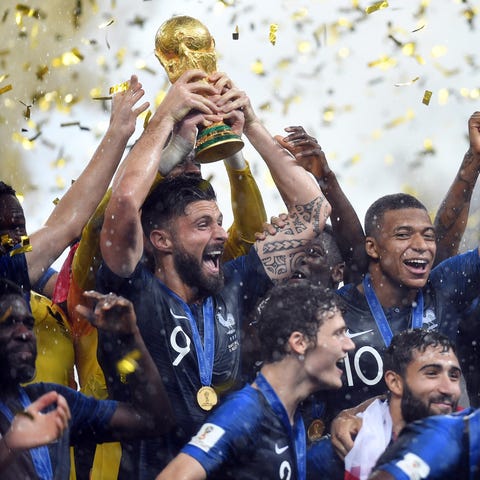 France players celebrate after winning the World C