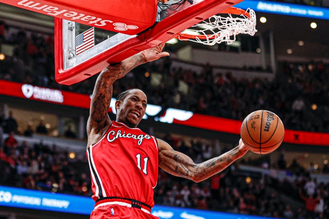 March 31: Chicago Bulls forward DeMar DeRozan dunks the ball against the LA Clippers in overtime at United Center. DeRozan scored 50 points in the Bulls' victory.