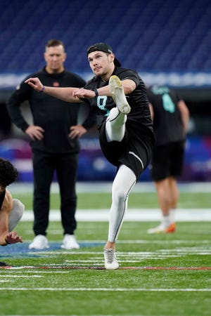 LSU kicker Cade York (08) participates in a drill at the NFL football scouting combine in Indianapolis, Sunday, March 6, 2022. (AP Photo/Steve Luciano)