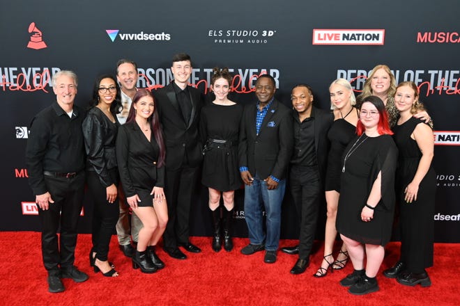 MTSU President Sidney A. McPhee (center) stands with faculty, students and recent alumni from the university’s College of Media and Entertainment on the red carpet before Friday night’s MusiCares fundraiser at the site of the 2022 Grammy Awards in Las Vegas.