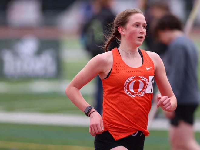 Sprague's Sara Abbott leads the pack in the 1,500 meter race during the Titan Track Classic at West Salem High School in Salem, Ore. on Friday, April 1, 2022.