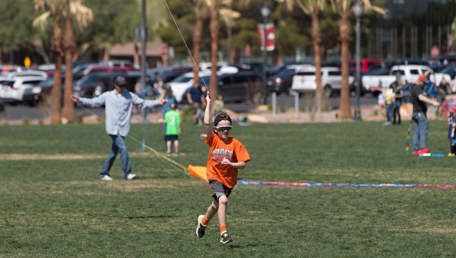 Community members gather at Dixie State University for the annual Kite Festival Saturday, April 2, 2022. 